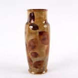 A Royal Doulton Lambeth stoneware vase, decorated autumn leaves,