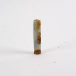 A Chinese mutton fat jade pen handle carved with a bat, 5.