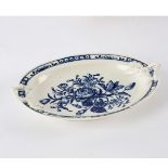 An 18th Century Worcester blue and white oval stand, rose pattern, crescent mark,