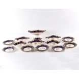Sixteen early 19th Century dessert plates, five serving dishes and a stemmed fruit bowl,