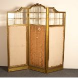 An Edwardian giltwood framed three-fold screen,