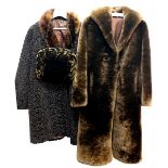 An astrakhan jacket with fur collar,