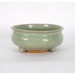 A Ming celadon glaze censer, incised, on three feet, 16.