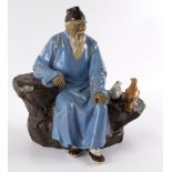 A Chinese pottery figure by Liu Zemian of Qi Baishi former Chairman of China's Artists Union