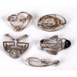 Five Charles Rennie Mackintosh style brooches, one with Edinburgh hallmarks, approximately 22.