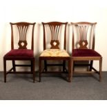 Three 18th Century mahogany dining chairs with shaped cresting rails,