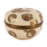 A fine Japanese Satsuma circular bowl and cover, painted with roundels of leaves and flowers,