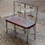 A wirework jardinière stand of bench form,