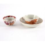 A Chinese iron red tea bowl and saucer,