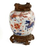 An 18th Century Chinese Imari vase, with later European gilt metal mounts,