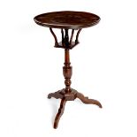 An 18th Century Scandinavian elm table, on turned column and tripod support,