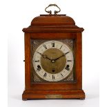 An Elliott eight-day mantel clock, dial signed Arthur Saunders, London, in a mahogany case,