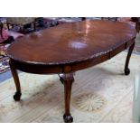 A Queen Anne style mahogany extending dining table, fitted one leaf,