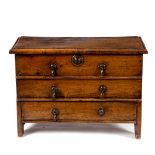 An 18th Century Welsh fruitwood chest, with false two drawer and single drawer front, 58.