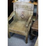 A 17th Century oak armchair,