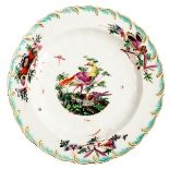 A Chelsea plate painted exotic birds within a gold and turquoise foliate border, gilt anchor mark,