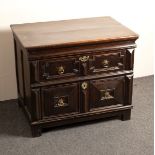 A Charles II oak two-drawer chest, circa 1680, the top drawer geometrically moulded,