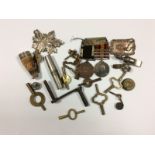 A Universal brass clock key, other clock keys etc.