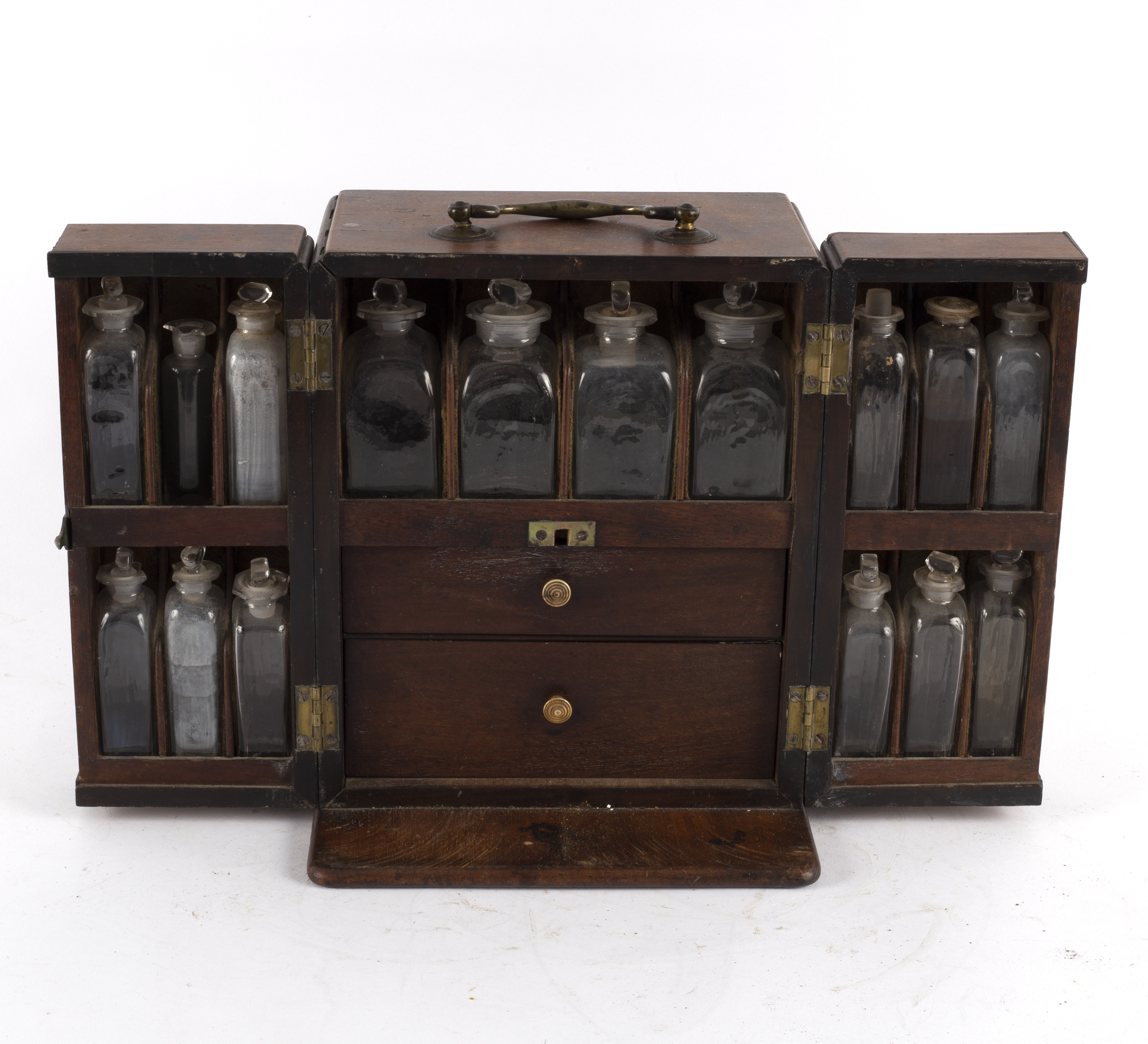 A 19th Century apothecary box, the hinged doors concealing compartments containing medicine bottles,