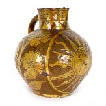 A dated Barnstaple slipware harvest jug,