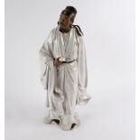 A Chinese pottery figure by Liu Zemian of Guan Hanqing, composer of opera and poetic drama,