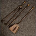 A set of early 19th Century burnished steel fire irons with brass knops (3)/Provenance: Phillips 09.