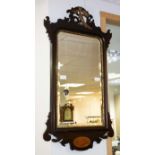 A George III style mahogany & parcel gilt fretwork wall mirror with ho-ho bird crest,