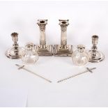 A pair of silver desk candlesticks, JD & S, Sheffield 1895, of Corinthian column form, 15cm high,