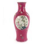 A Chinese famille rose ruby ground medallion vase, the medallions decorated birds,