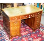 A mahogany pedestal desk,