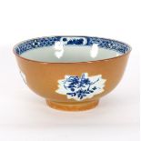 A Chinese Batavian blue and white bowl with café au lait ground exterior,