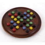A solitaire board, the coloured marbles for the same and various boxes etc.