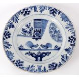 A late 18th Century blue and white English Delftware dish decorated a cock fighting scene,