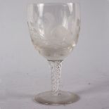 A wine glass etched a squirrel, on an air twist stem and circular base, 15.