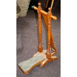 An oak boot jack by Tom Hill, with ivorine trade label 'Tom Hill, London SW1, (Knightsbridge) Ltd',