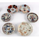Three Japanese Imari circular dishes, 18th Century,