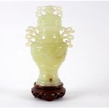 A Chinese pale celadon bowenite baluster vase and cover, 20th Century,