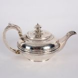 A George IV silver teapot, possibly William Bateman, London 1821, with thread borders and crest,