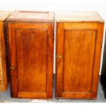 A pair of mahogany brass bound cupboards enclosed by panel doors and an upholstered footstool with
