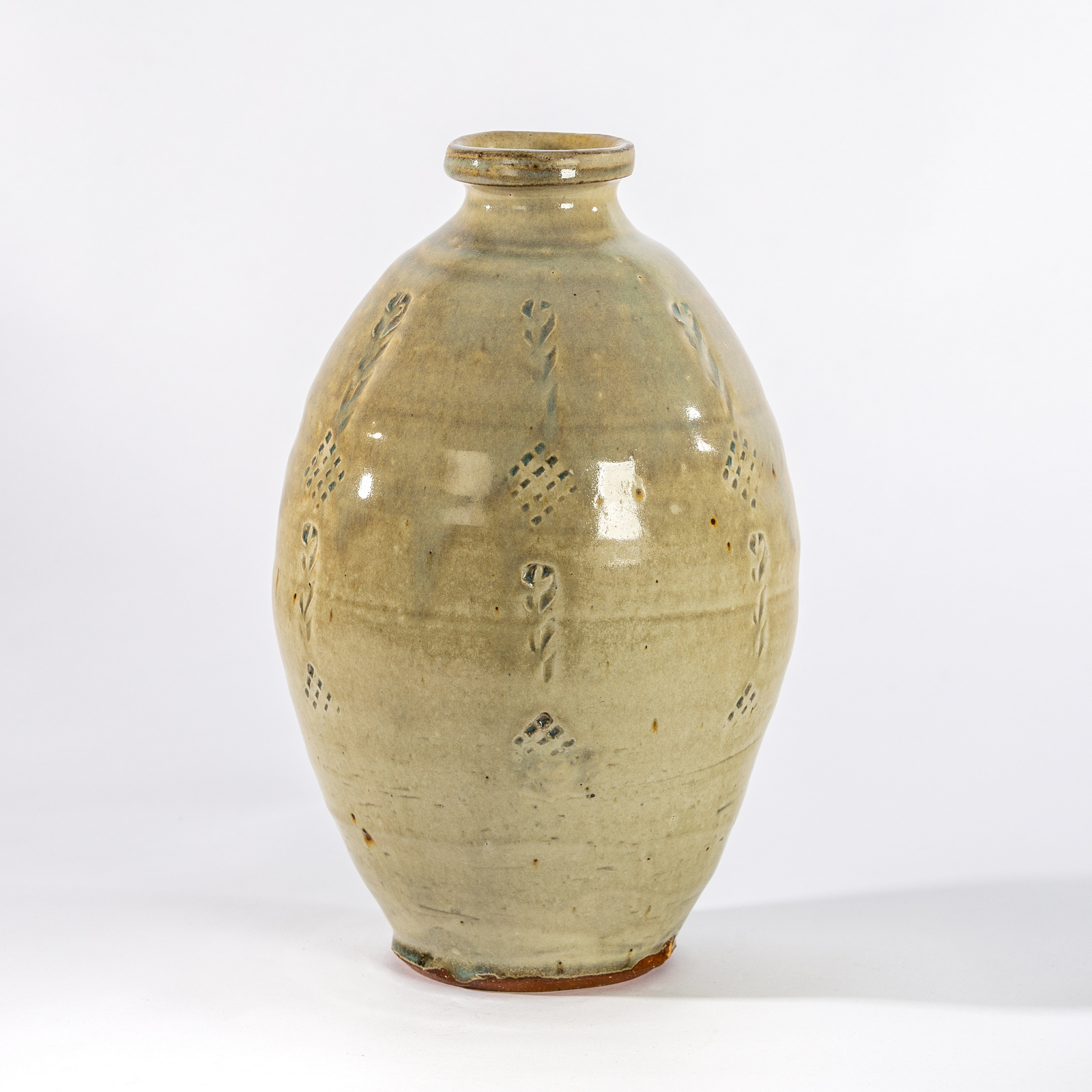 Mike Dodd (British, born 1943), a celadon glaze bottle vase with leaf and diamond dot cut designs, - Image 2 of 2