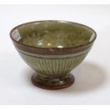 Richard Batterham (British, born 1936), a footed celadon bowl with fluted sides,