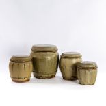 Mike Dodd (British, born 1943), four celadon glazed storage jars and covers,