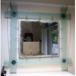 A contemporary frosted glass framed mirror,