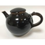 Ray Finch for Winchcombe Pottery, a 1980s teapot with inset lid, tenmoku glaze, impressed mark,