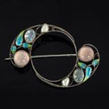 Charles Horner, an Art Nouveau silver brooch, of stylised scroll shape,