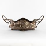 An Art Nouveau bowl with stylised handles to each end,