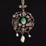 An Art Nouveau pendant of wreath form,