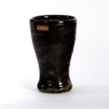 Shoji Hamada (Japanese 1894-1978), a stoneware beaker of cylindrical tapering form,