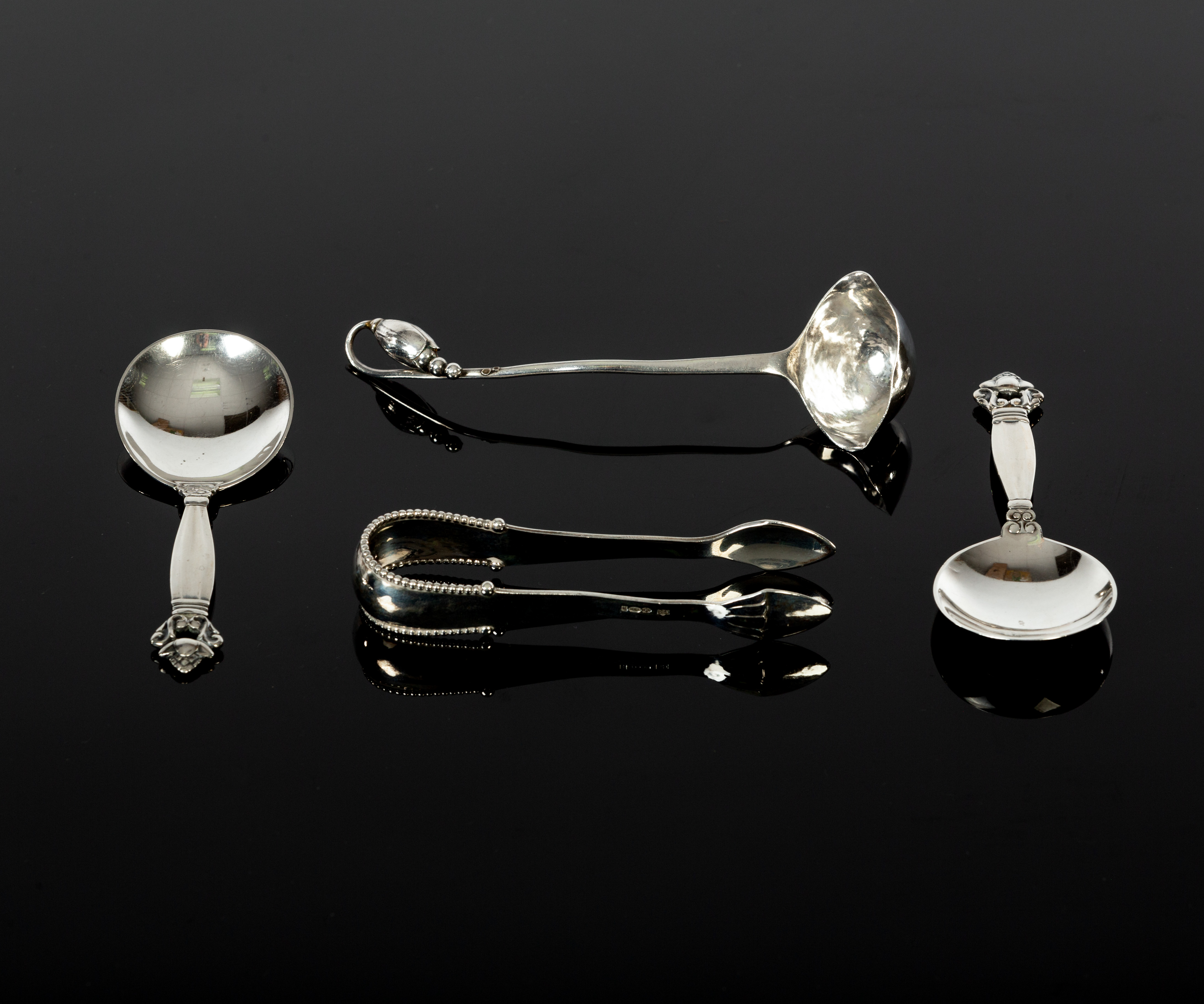 Johan Rohde for Georg Jensen, a pair of Danish silver caddy spoons, import marks, George Stockwell,