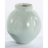 Studio Pottery, a pale celadon lobed porcelain vase, indistinct mark,